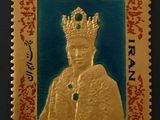 a close up of a stamp with a picture of a man wearing a crown