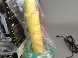 a banana that is wrapped in plastic and sitting on a table
