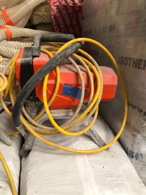 a pile of fire hoses and hoses on the ground