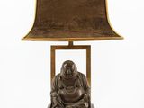 buddha lamp with a brown shade on a white background