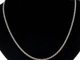 a close up of a necklace on a mannequin mannequin