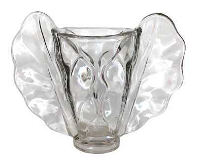a clear glass vase with a leaf design on it