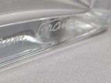 a close up of a glass object on a table