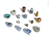 a lot of small objects that are on a white surface