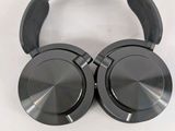 a close up of a pair of headphones on a white surface