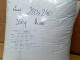 a bag of flour sitting on a table in front of a box