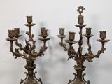 pair of antique brass candelabs with flowers and leaves