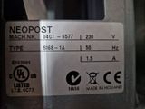 a label on the back of a machine that says neopost