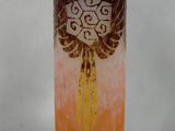 a vase that has a design on the side of it