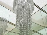 a chandelier hanging from the ceiling of a building