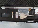 a tool in a case that is sitting on the floor