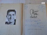 an open book with a picture of a man on it