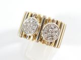 an image of a pair of gold and diamond rings