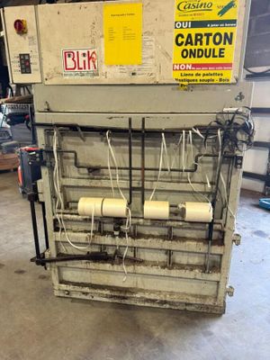 a machine that has a roll of paper on it