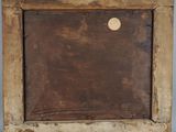 an old wooden frame with a hole in the middle of it