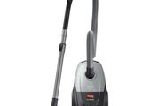 a silver and black vacuum cleaner with a black handle