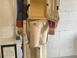 a statue of a soldier with a box in his hand
