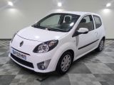 a picture of a small white car on a checkered floor