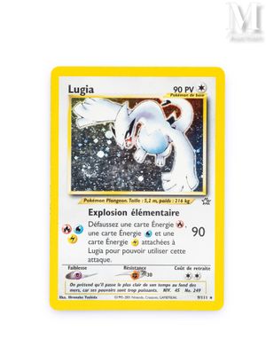 a close up of a pokemon card on a white surface