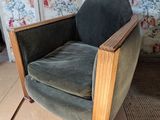 a chair that is sitting in the middle of a room