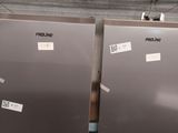 two refrigerators that are sitting on a shelf in a store