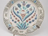 an image of a decorative plate with a floral design on it
