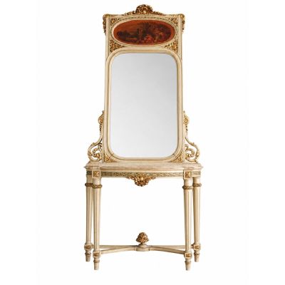 an ornately decorated mirror on a stand with a mirror on top