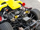a close up of a yellow and red race car