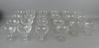 a lot of empty wine glasses sitting on a table