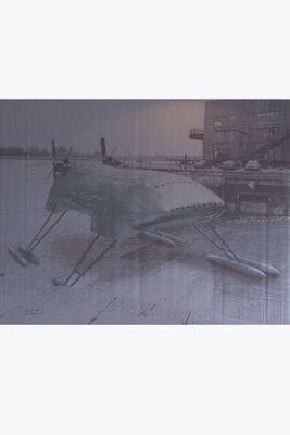 a picture of a plane that is sitting in the snow