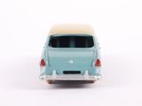 a small toy car that is sitting on a white surface