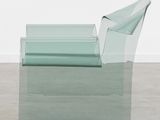 an image of a chair made out of a piece of glass