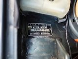 a close up of a car ' s dashboard with a sticker on it