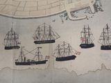 many ships that are on a map on the wall