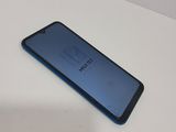 a close up of the back of a blue samsung galaxy s9