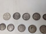 a lot of coins that are sitting on a table