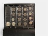 an image of a display case with coins in it