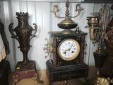 a clock that is sitting on a table in a room