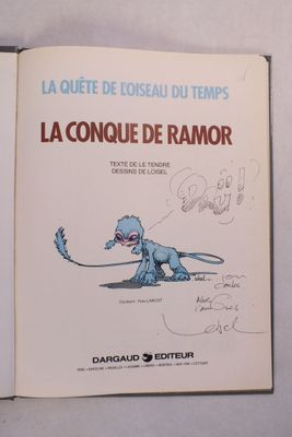un livre ouvert sur lequel est dessiné un dinosaure