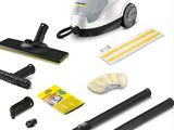 a close up of a vacuum cleaner and cleaning supplies on a white background
