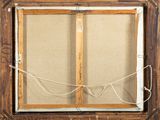 a close up of a picture frame on a wall with a rope