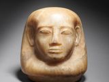 an egyptian marble head of a woman