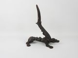 an image of a sculpture of a lizard on a white background