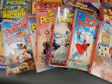 a lot of comic books on the table