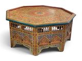 an image of a wooden table with a colorful design on it