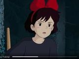 an image of a girl with a red bow on her head sitting in front of a tree