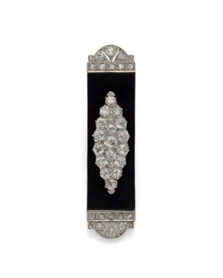une broche Art déco en diamants et onyxine