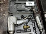 two tools in a case on the floor