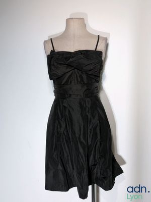 black strapless dress on a mannequin display on a mannequin stand