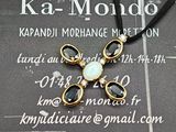 une photo d'un collier orné d'une croix
